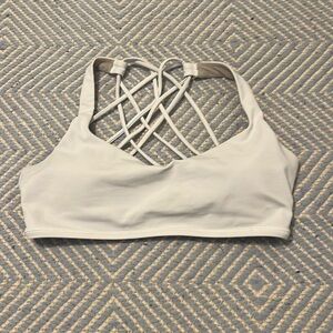 Never worn white Lululemon free to be wild bra